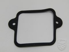 Gasket for luggage compartment lamp